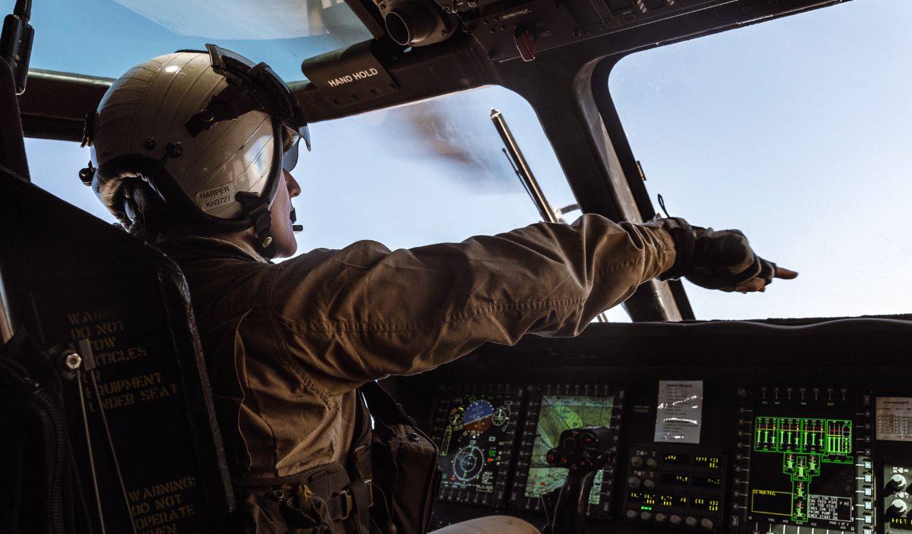 A U.S. Marine Corps pilot operates a CH-53K King Stallion over the Chocolate Mountain Aerial Gunnery Range during a training exercise in California. Photo by the U.S. Marine Corps.